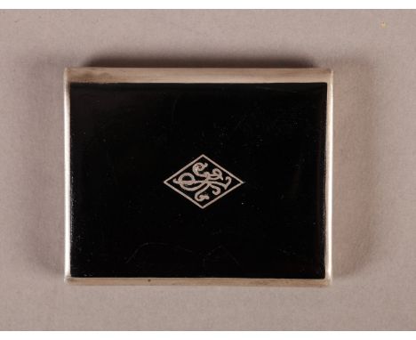 A SILVER AND BLACK ENAMEL VESTA CASE, the hinged front (sliding vertically to open) with initialled lozenge to centre, the in