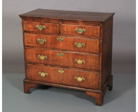 AN 18TH CENTURY WALNUT CROSSBANDED CHEST of two short and three long graduated drawers, line inlaid with ebony and boxwood st