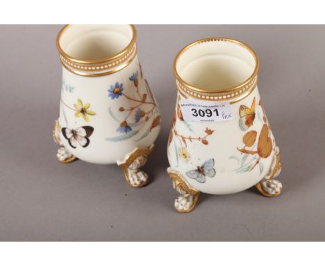 A PAIR OF ROYAL WORCESTER VASES, of tapered form, the cream ground painted and gilt with butterflies amongst grasses and spra