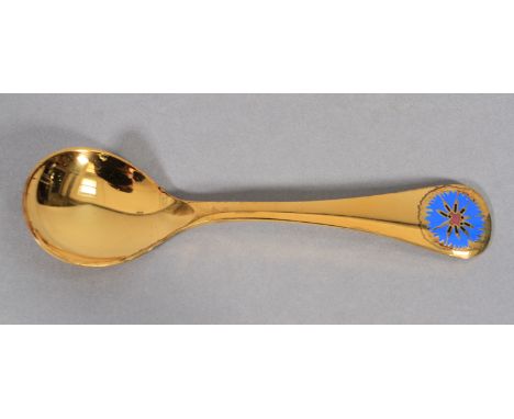 GEORG JENSEN, a .925 silver gilt year spoon for 1972 with cornflower motif in blue and aubergine enamel, 15cm long 
