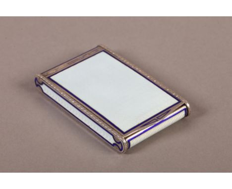 A CONTINENTAL SILVER AND ENAMEL COMPACT, the engine turned body with pale blue opalescent panels within blue borders, cast le