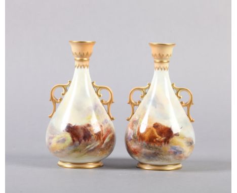 A PAIR OF ROYAL WORCESTER VASES painted by Harry Stinton with highland cattle in misty mountain landscapes, the ovoid body wi