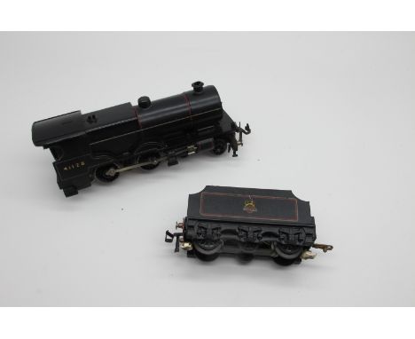 A Post War 'OO' Trix 4-4-0 Engine and Tender, R/No 41128, finished in BR black, playworn, boxed.