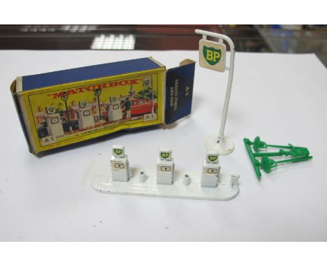 Matchbox A-1 Accessory Pack 'Garage Pumps and Sign', some minor chipping, wear, lamps and figure stick on sprue, boxed, stain