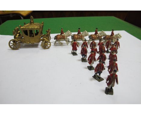 A 1950's Coronation Coach and Footmen, by Johillco, playworn.