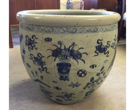 A large blue & white oriental decorative planter.