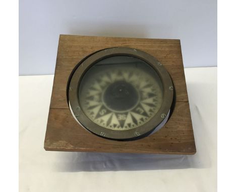 An antique copper ships compass dated 1910. From an old Irish light ship.  Part of the collection of the late Colin MacFarlan