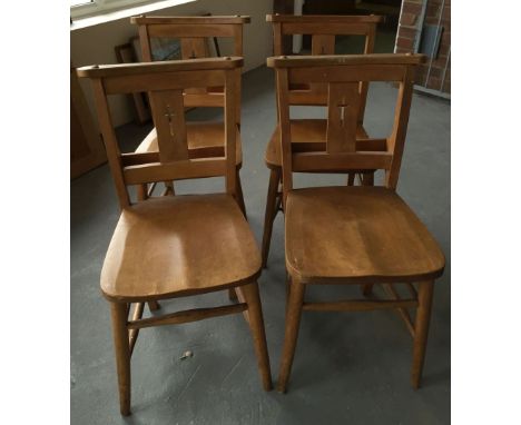 4 light wood vintage chapel chairs.