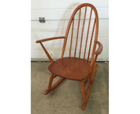 A childs Ercol rocking chair.