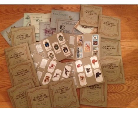 22 sets of vintage cigarette cards (15 sets loose in albums &amp; 7 stuck into albums) - to include Players Dogs, Wills 'Do Y