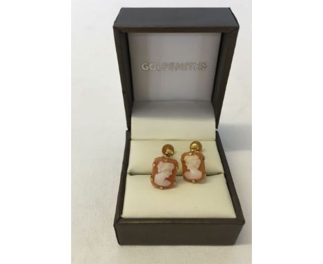 A pair of vintage hallmarked 9ct gold & cameo earrings with screw fittings.