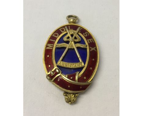 Large silver gilt & enamel masonic medal. Hallmarked Birmingham 1910. Front detail states Middlesex, Assistant. Size approx 8