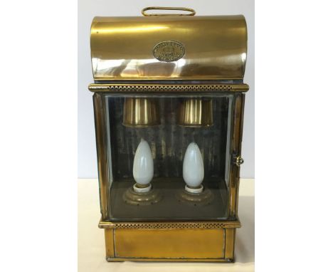 An antique brass ships double light lantern by Wm. Harvie & Co Ltd, Birmingham converted to electricity. From an Irish light 