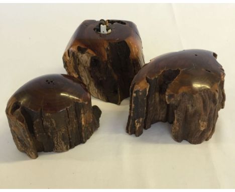 An African hardwood table lighter with African hardwood salt & pepper pots.