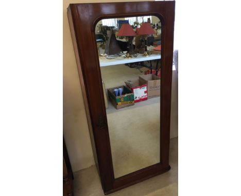 A mahogany 3 shelf cabinet with mirrored front. 59cm wide x 134cm tall.