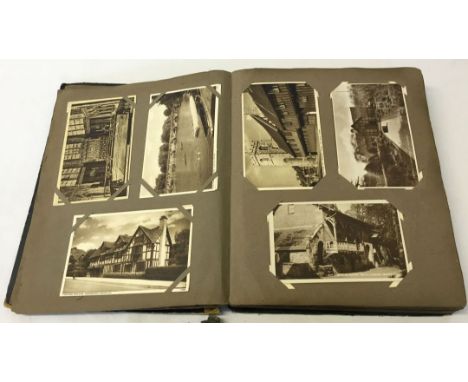 An album of approx 250 vintage photographic postcards - no spine and cover loose to album.