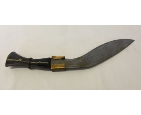 A horn handled Kukri dagger.
