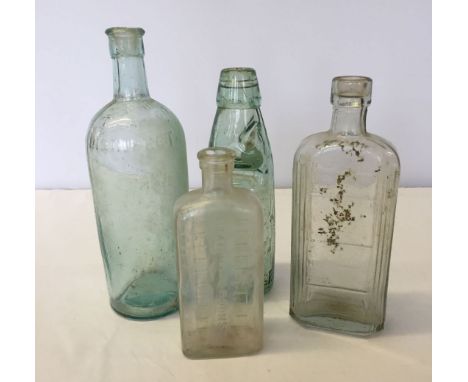 4 vintage glass bottles.