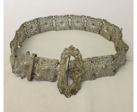 An ornate vintage white metal ladies belt. 58 to 72cm.