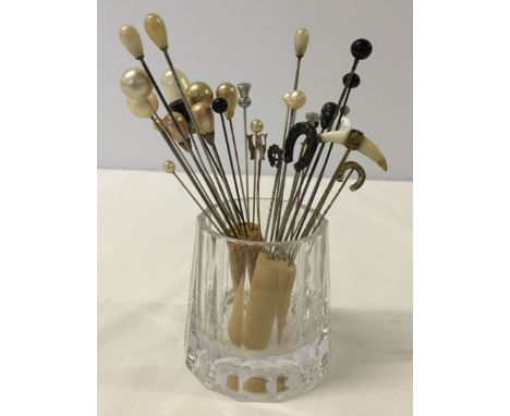 A collection of 30 vintage hatpins.