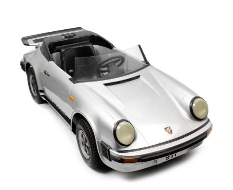 A Porsche 'Junior' 911 Carrera single-seat child's car,box-section steel chassis, simple spring suspension, fitted with silve