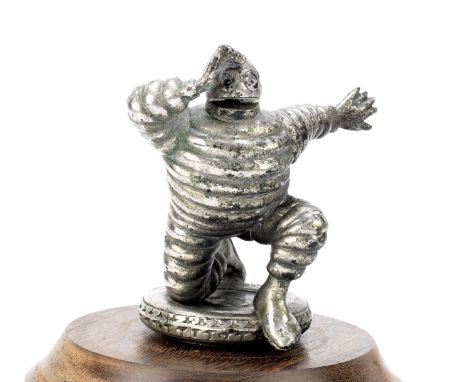 A 'Mr Bibendum' mascot for Michelin 'Cable' Tyres by Generes, French, circa 1920,nickel plated bronze mascot, (some plating r
