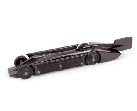 A 'Golden Arrow' Land Speed Record Bakelite clockwork toy by A.G.Ltd, Patented 1929,brown 'Ranlite' Bakelite body, produced b