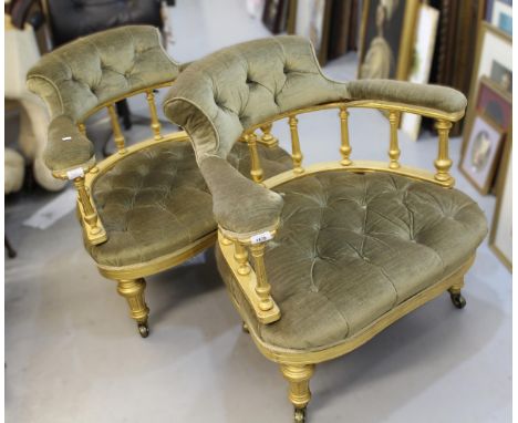 Pair of late 19th Century gilt wood and button upholstered tub shaped drawing room chairs, raised on turned tapering fluted s