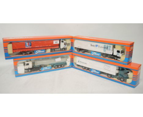 Group of four Tecno 1:50 scale boxed model trucks