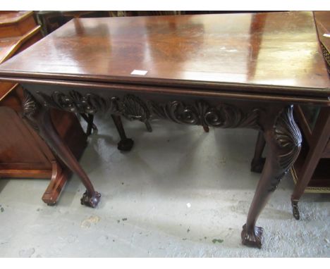 19th Century mahogany rectangular fold-over tea table in Irish Chippendale style, with a single end drawer, shell and scroll 