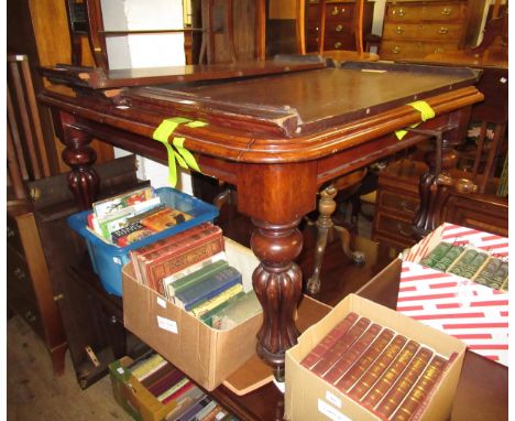 Victorian mahogany wind-out extending dining table, the moulded top above a plain frieze and four baluster turned and fluted 