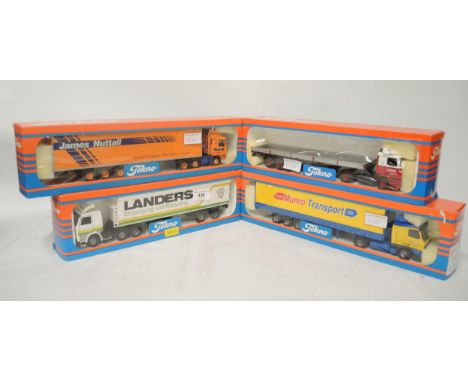 Group of four Tecno 1:50 scale boxed model trucks