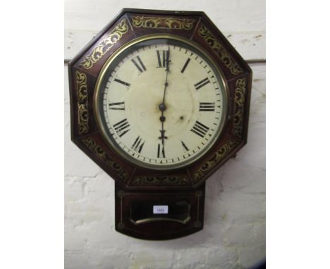 Regency rosewood brass inlaid octagonal drop-dial wall clock, the enamel dial with Roman numerals, and a single train fusee m