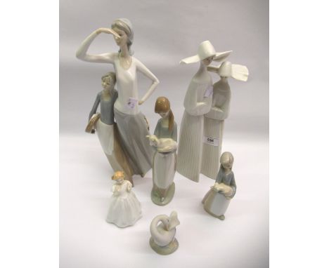 Lladro figural group of two nuns, Lladro figure of a goose, Nao figure of mother and daughter, two smaller Lladro figures and