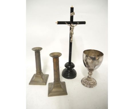 Box containing a collection of various items, including crucifix, leather Bible, pair of brass candlesticks, plated goblet et