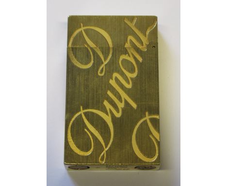 S.T. Dupont, Paris, gold plated cigarette lighter in pouch