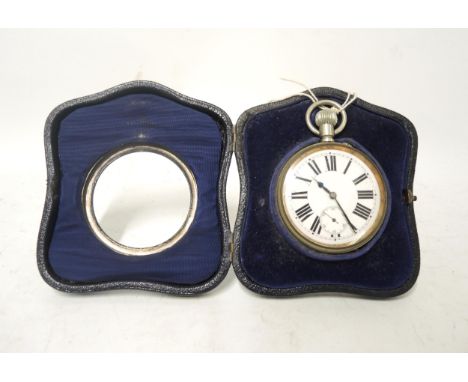 Nickel plated Goliath pocket watch, in an enamel decorated leather case with backstand