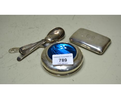 Silver and blue enamel circular salt, small silver cigarette case, and four various silver spoons
