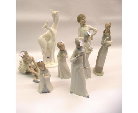 Small Lladro figure of a kneeling girl, together with six other various Nao and other similar figures and a Royal Doulton ' I