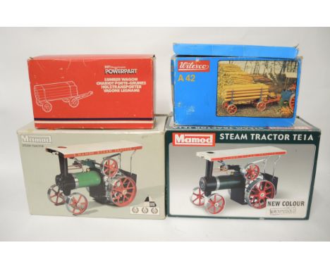 Two Mamod steam driven model traction engines, together with two timber wagons, all in original boxes