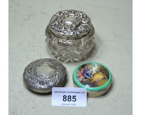 Circular silver enamel decorated trinket box, circular embossed box, and a silver mounted dressing table jar