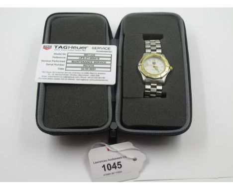 Tag Heuer Professional mid sized wristwatch with white dial and date aperture, in original case with registration cardThe wat