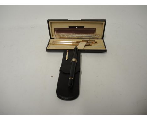 Montblanc fountain pen and biro in leather case, together with a Sheaffer gold plated pen and ballpoint set in original box