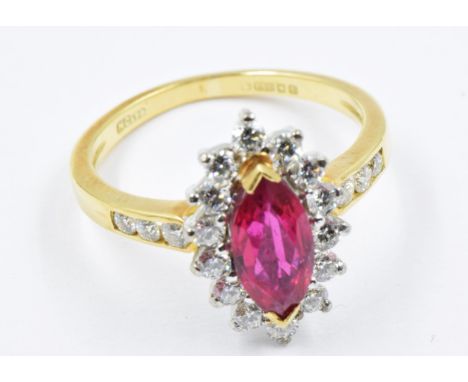 18ct Yellow gold ruby and diamond cluster ring, size K, 3.7gIn excellent condition with no damage or repair noted.  The ruby 