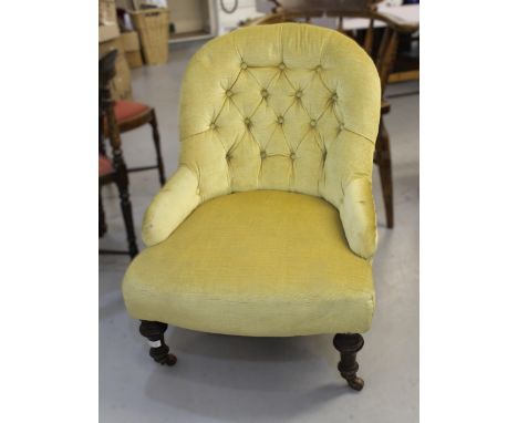 Two Victorian button upholstered tub chairs on turned tapering supports
