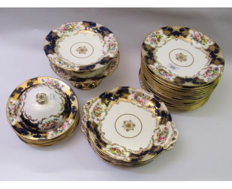 Coalport for Daniell, London part dinner and dessert service, comprising eighteen dinner plates, two comports, muffin dish, f