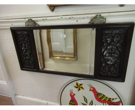 Early to mid 20th Century Chinese hardwood wall mirror with flanking pierced fretwork panels