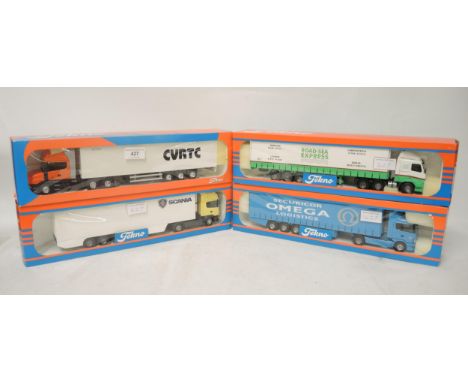 Group of four Tecno 1:50 scale boxed model trucks