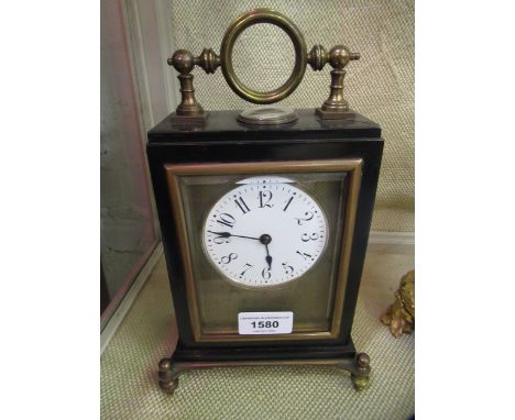 19th Century French black slate and gilt brass mantel clock with unusual hoop handle, the circular enamel dial with Arabic nu