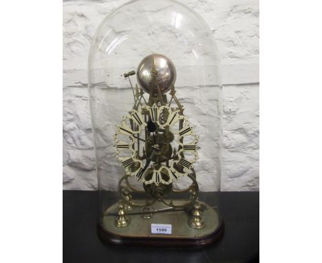 Gilt brass skeleton clock, the pierced enamel dial with Roman numerals with a single train fusee movement striking on a bell,